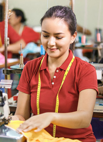 a women worker stinting t-shirt at custom t house